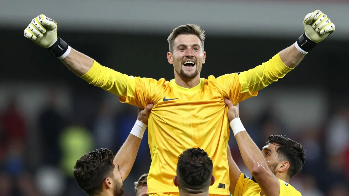 Goalkeeper Peter Abrahamsson was lifted by teammates after Häcken's home match against Malmö FF in the Allsvenskan on 1...